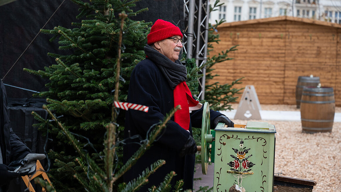 Drehorgelspieler auf der Grünen Messe